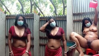 Desi bhabi strips in bathroom showing big boobs and peeing before finger herself